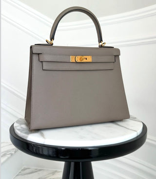 Hermes’ Kelly 28 Gris Asphalt w Gold Hardware