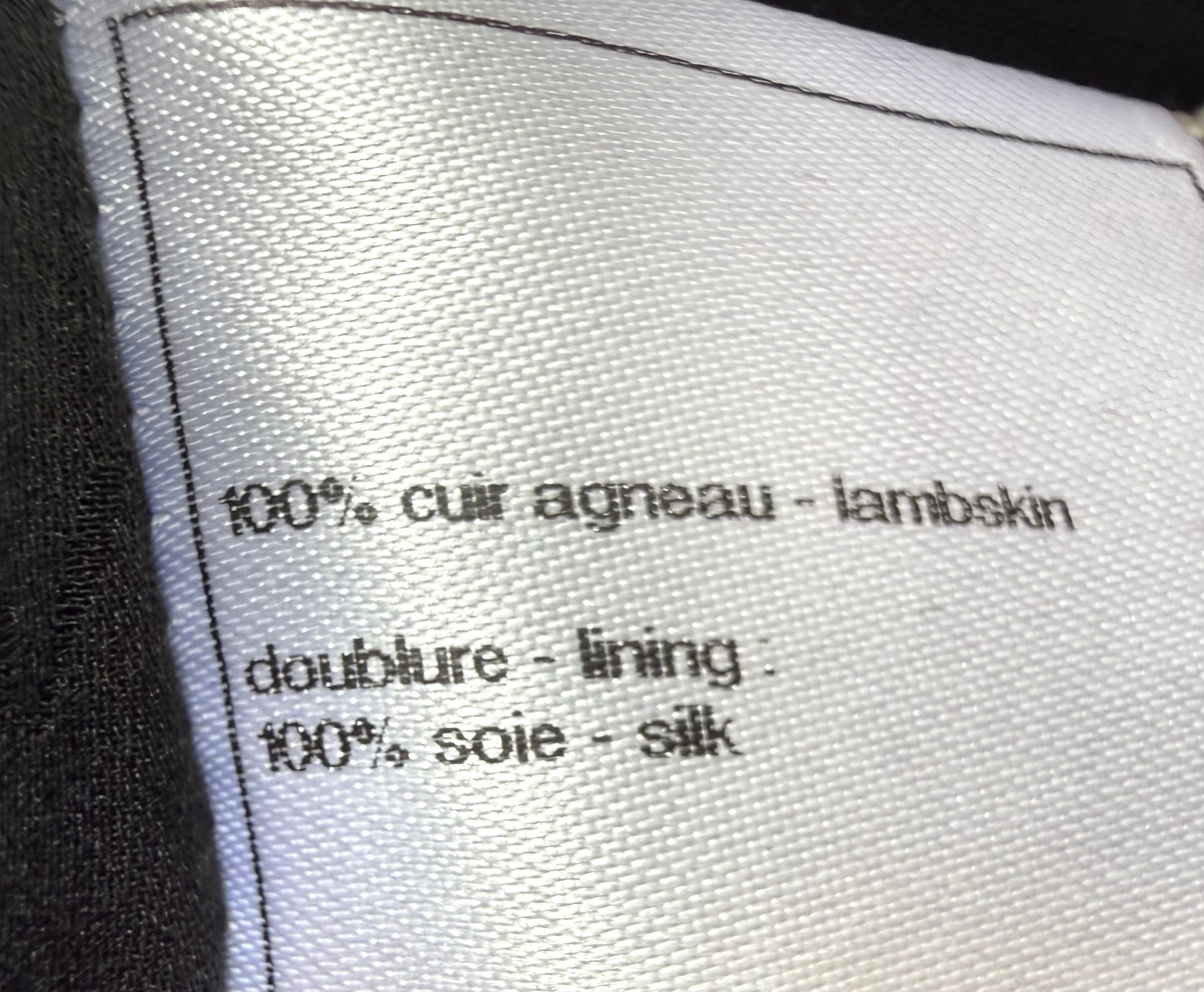 Chanel Black Leather Asymmetrical Cropped Jacket